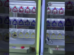 ミニキーマスター賞金自動販売機 最新デザイン プッシュ・ウィン・ギフトゲーム機 9ホール